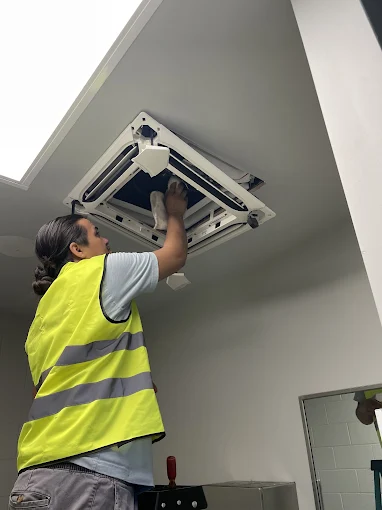 Ductless mini-split heat pump installation by A-OK Services technician San Antonio