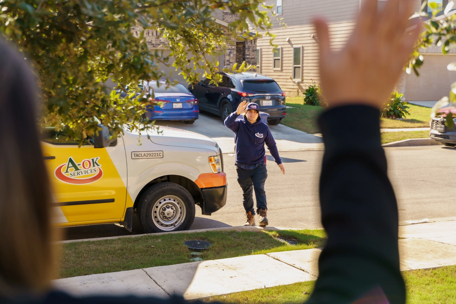A-OK Services HVAC technician on service call in Sandy Oaks, TX