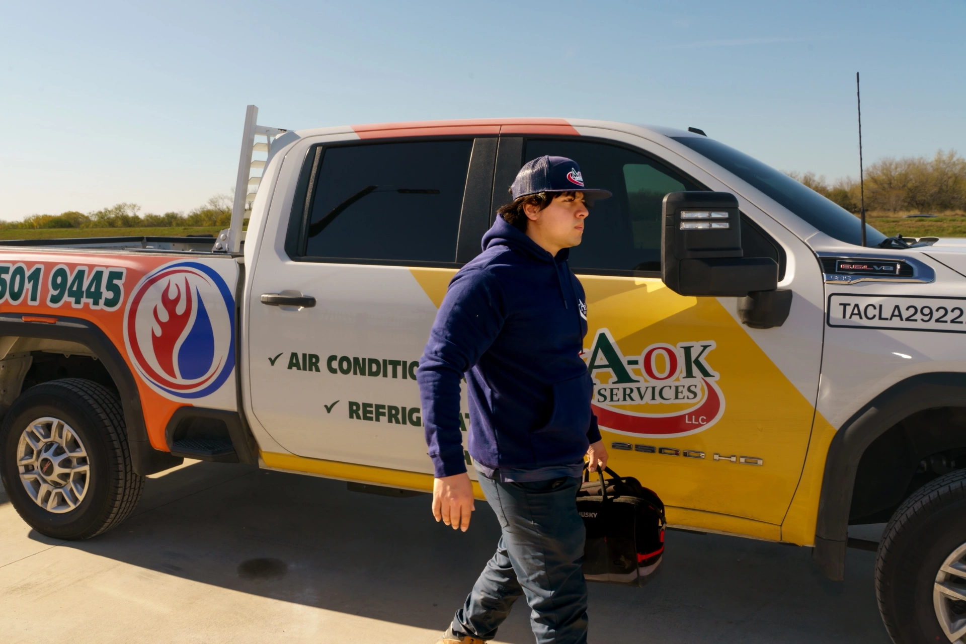A-OK Services Licensed TACLA29221C HVAC Technician with Branded Service Truck in San Antonio TX